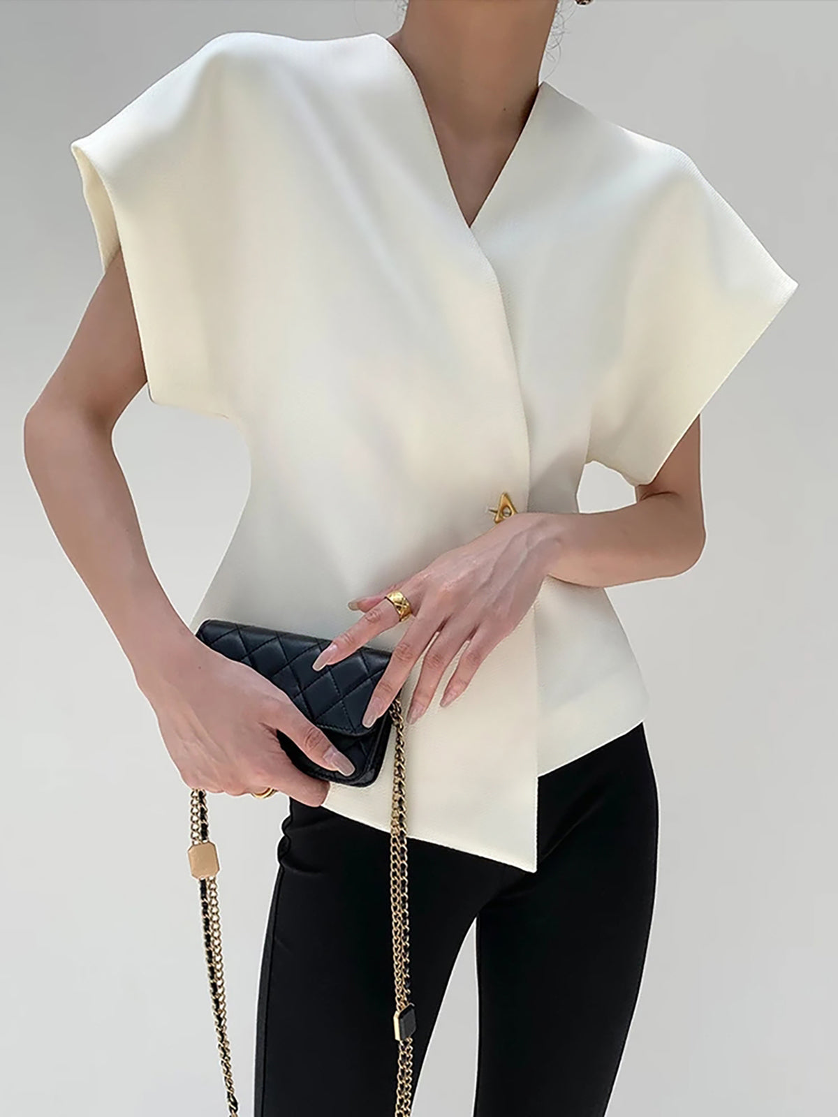 Ruœgy Button Down V Neck Blouse