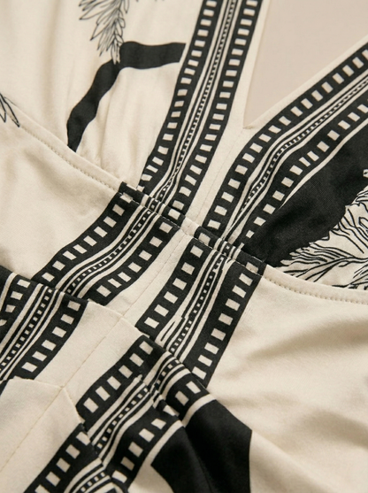 Ruœgy Robe Midi Imprimée à Col En V Femme